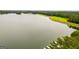Peaceful lakefront view with lush green trees at 3153 Sweetbriar Dr, Villa Rica, GA 30180