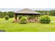 Stone and wood pavilion in a green space at 3153 Sweetbriar Dr, Villa Rica, GA 30180