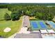 Aerial view of tennis courts, clubhouse, and pool at 3153 Sweetbriar Dr, Villa Rica, GA 30180
