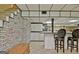 Finished basement with bar, cabinets, and seating at 100 Aspen Way, Fayetteville, GA 30214