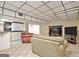 Finished basement with comfortable seating and fireplace at 100 Aspen Way, Fayetteville, GA 30214