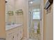 Guest bathroom with shower and tile floor at 100 Aspen Way, Fayetteville, GA 30214