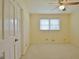 Spacious bedroom with ceiling fan and closet at 100 Aspen Way, Fayetteville, GA 30214