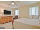 Bedroom with large dresser and ceiling fan at 100 Aspen Way, Fayetteville, GA 30214