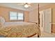 Bright bedroom with double windows and ceiling fan at 100 Aspen Way, Fayetteville, GA 30214
