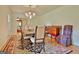 Spacious dining room featuring a large table and buffet at 100 Aspen Way, Fayetteville, GA 30214