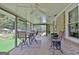 Relaxing screened porch overlooking backyard at 100 Aspen Way, Fayetteville, GA 30214