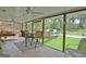Spacious screened porch with pool view at 100 Aspen Way, Fayetteville, GA 30214