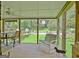 Screened porch with pool view and seating at 100 Aspen Way, Fayetteville, GA 30214
