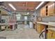 Basement workshop with tools and storage cabinets at 100 Aspen Way, Fayetteville, GA 30214