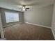 Bedroom with carpet flooring and ceiling fan at 235 Long Dr, Mcdonough, GA 30253