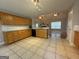 Open kitchen with granite countertops and wood cabinets at 235 Long Dr, Mcdonough, GA 30253