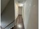 Simple hallway with wood-look flooring at 2691 Old South Dr, Jonesboro, GA 30236