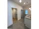 Modern bathroom with hexagonal tile and dual vanities at 165 Kelmscott Ln., Fayetteville, GA 30214