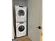 Stackable washer and dryer in convenient laundry closet at 165 Kelmscott Ln., Fayetteville, GA 30214