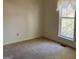 Bright bedroom with window and neutral decor at 10420 Summer Creek Dr, Alpharetta, GA 30022