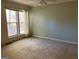 Spacious bedroom with large windows and ceiling fan at 10420 Summer Creek Dr, Alpharetta, GA 30022