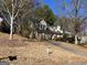 House on a hill with a long driveway at 10420 Summer Creek Dr, Alpharetta, GA 30022