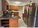Kitchen with stainless steel appliances and an island at 10420 Summer Creek Dr, Alpharetta, GA 30022