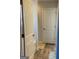 Bathroom with wood-look flooring and two doors at 11934 Lovejoy Crossing Blvd, Hampton, GA 30228