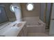 Relax in this bathroom with a jetted tub and shower at 2673 Northforke Ct, Tucker, GA 30084