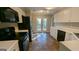 Kitchen with white cabinets, stainless steel appliances, and access to a deck at 2673 Northforke Ct, Tucker, GA 30084