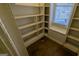 Well-organized pantry with ample shelving for storage at 2673 Northforke Ct, Tucker, GA 30084