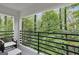 Private balcony overlooking lush trees at 1153 Dawn View Nw Ln, Atlanta, GA 30327