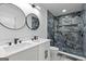 Modern bathroom with double vanity and walk-in shower at 1153 Dawn View Nw Ln, Atlanta, GA 30327