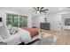 Spacious bedroom with hardwood floors and access to a balcony at 1153 Dawn View Nw Ln, Atlanta, GA 30327