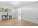 Light-filled bedroom with hardwood floors and an ensuite bathroom at 1153 Dawn View Nw Ln, Atlanta, GA 30327