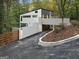 Modern two-story home with sleek design and private driveway at 1153 Dawn View Nw Ln, Atlanta, GA 30327