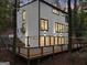 Modern house with a deck and wooded setting at 1153 Dawn View Nw Ln, Atlanta, GA 30327