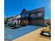 Modern farmhouse exterior with two-car garage and landscaping at 924 Wemberley Ln, Marietta, GA 30064