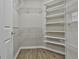 Large walk-in closet with wire shelving and hanging rods at 155 Rehobeth Way, Fayetteville, GA 30214