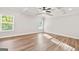 Spacious main bedroom with wood floors and coffered ceiling at 253 Gordon Oaks Way, Moreland, GA 30259