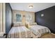 Bright bedroom with two twin beds and dark accent wall at 429 Burgundy Se Ter, Atlanta, GA 30354