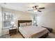 Main bedroom with two nightstands and a ceiling fan at 429 Burgundy Se Ter, Atlanta, GA 30354