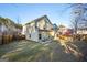 Tan house exterior with a small patio and fenced yard at 429 Burgundy Se Ter, Atlanta, GA 30354