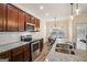 Modern kitchen with stainless steel appliances and granite countertops at 429 Burgundy Se Ter, Atlanta, GA 30354