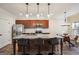 Spacious kitchen with granite countertops, stainless steel appliances, and a center island with bar seating at 429 Burgundy Se Ter, Atlanta, GA 30354