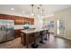 Stylish kitchen with a granite island, stainless steel appliances, and pendant lighting at 429 Burgundy Se Ter, Atlanta, GA 30354