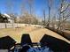 Fenced backyard with playset and raised garden bed at 504 Plantation Creek Dr, Loganville, GA 30052
