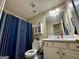 Clean bathroom with updated vanity and shower/tub combo at 504 Plantation Creek Dr, Loganville, GA 30052