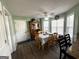 Bright dining area with built-in hutch and wood flooring at 504 Plantation Creek Dr, Loganville, GA 30052