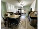 L-shaped kitchen boasting granite counters and stylish cabinetry at 504 Plantation Creek Dr, Loganville, GA 30052