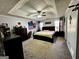 Large main bedroom with ceiling fan and ample closet space at 504 Plantation Creek Dr, Loganville, GA 30052