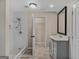 Updated bathroom with walk-in shower, vanity, and closet at 1256 Elizabeth Sw Ave, Atlanta, GA 30310