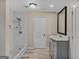 Modern bathroom with a walk-in shower and stylish vanity at 1256 Elizabeth Sw Ave, Atlanta, GA 30310