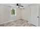 Spacious bedroom featuring wood-look floors and a ceiling fan at 1256 Elizabeth Sw Ave, Atlanta, GA 30310